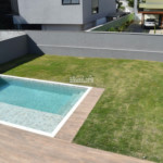 Casa à venda com 4 suítes no condomínio Figueira Garden, Atibaia - SP