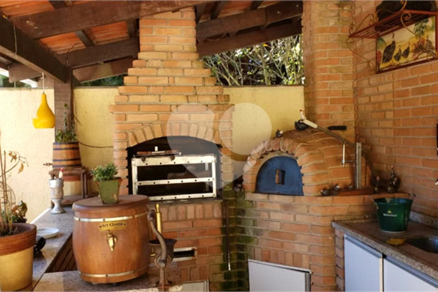 Casa à venda com 4 suítes no condomínio Alpes da Cantareira, Mairiporã - SP