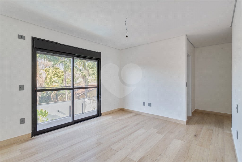 Casa à venda com 4 suítes no condomínio Villa Suiça, São Paulo - SP