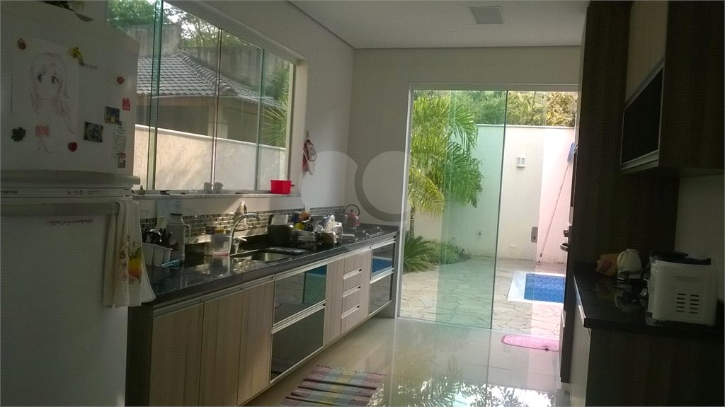 Casa à venda com 3 suítes,  no condomínio Aruã, Mogi das Cruzes - SP