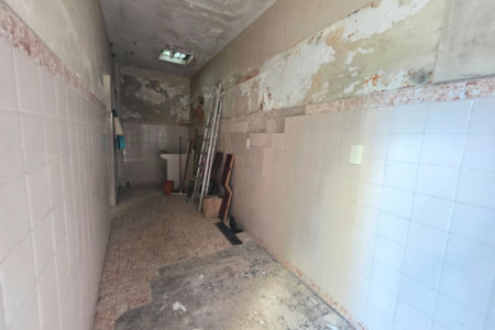 Sobrado com 3 dormitórios à venda, 129 m² por R$ 638.000,00 - Encruzilhada - Santos/SP