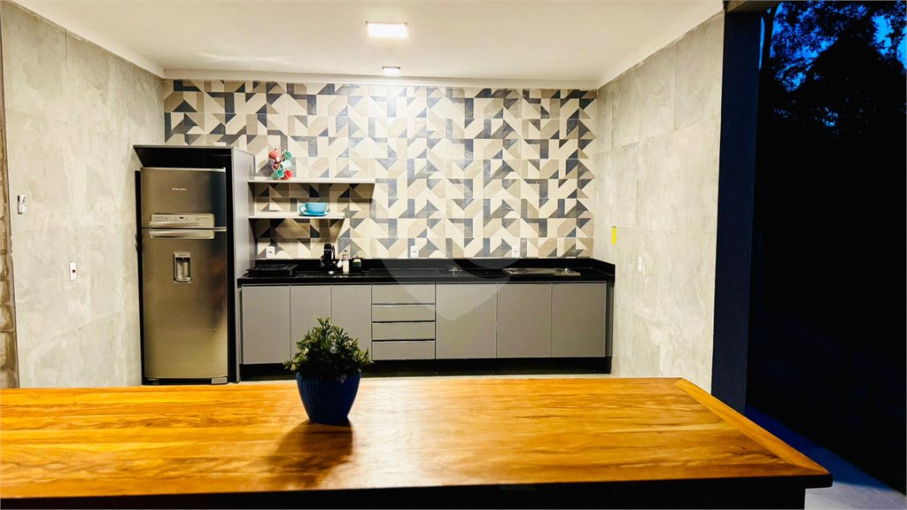 Casa à venda com 4 suítes no condomínio Portal Ouro Verde, Atibaia - SP