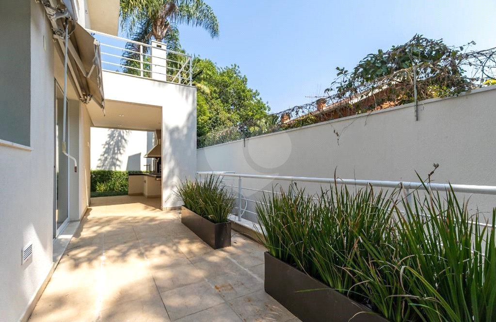 Casa à venda com 4 suítes no condomínio Vila Alba, São Paulo - SP