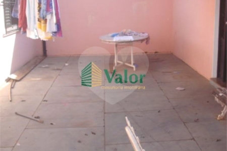 Casa com Edícula