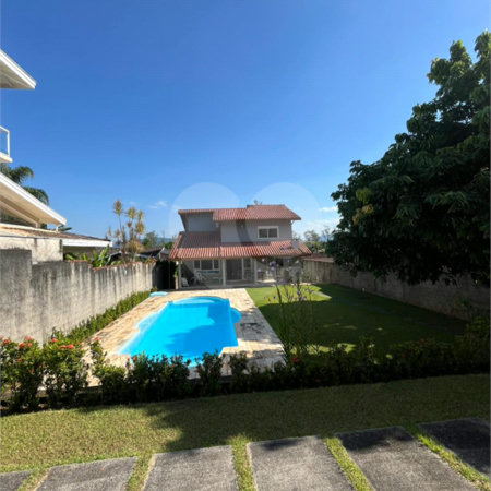 Casa à venda com 2 suítes no condomínio Recanto da Lagoinha, Ubatuba - SP