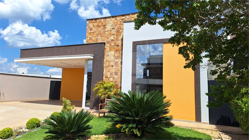 Casa à venda com 4 suítes no condomínio Alphaville Nova Esplanada 4, Votorantim - SP