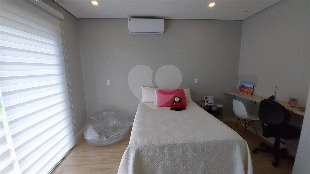 Casa à venda com 4 suítes no condomínio Figueira Garden, Atibaia - SP