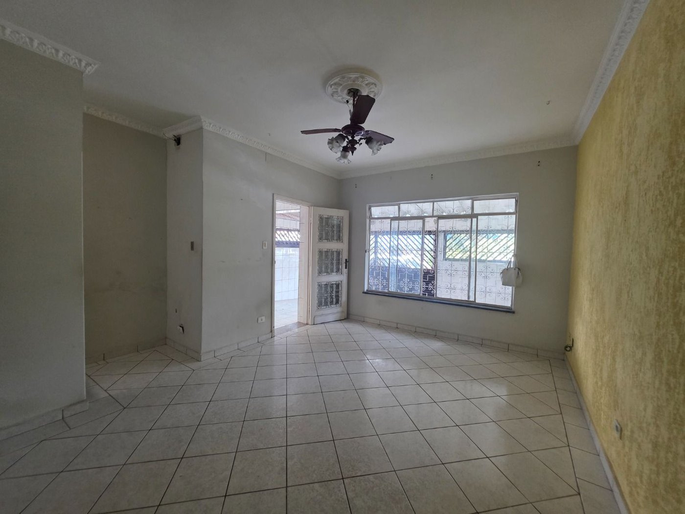 Sobrado com 3 dormitórios à venda, 129 m² por R$ 638.000,00 - Encruzilhada - Santos/SP