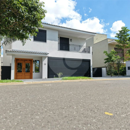 Casa à venda com 4 suítes no condomínio Alphaville Dom Pedro 3, Campinas - SP