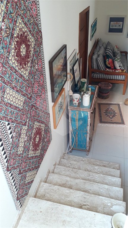 Casa à venda com 4 quartos, sendo 3 suítes, no condomínio Residencial Vila Esmeralda, São Sebastião - SP
