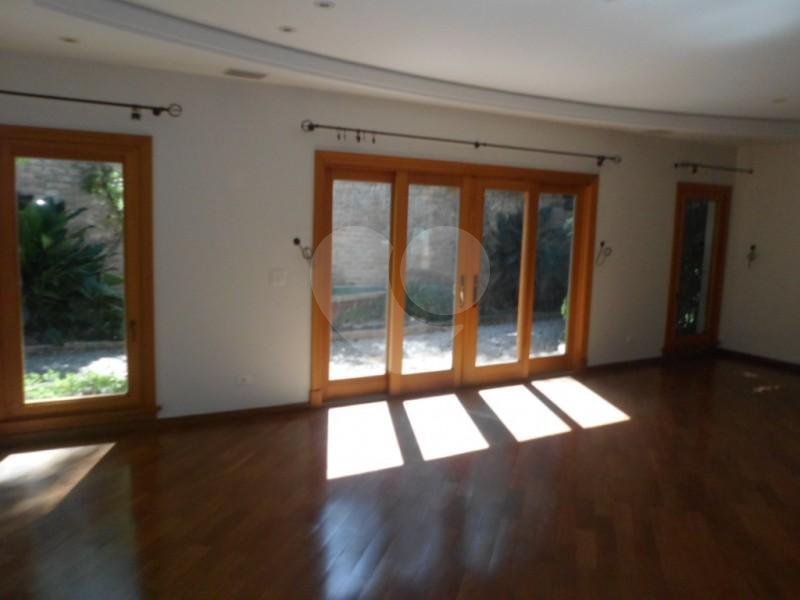 Casa à venda com 4 suítes no condomínio Jardim das Azaléias, São Paulo - SP