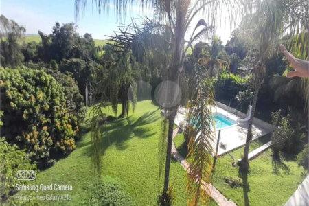 Casa à venda com 4 suítes no condomínio Residencial Vale das Laranjeiras, Indaiatuba - SP