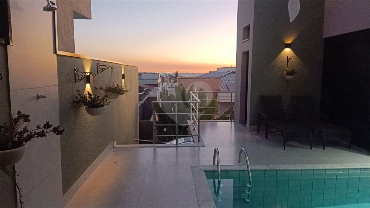 Casa à venda com 4 suítes no condomínio Sta Morriz, Campinas - SP