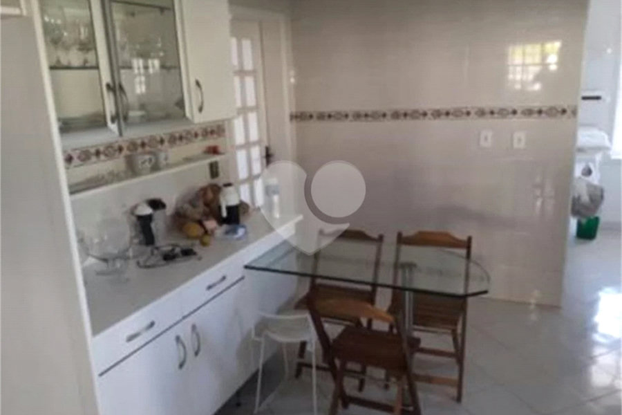 Casa à venda com 4 suítes no condomínio Suíça da Cantareira, Mairiporã - SP