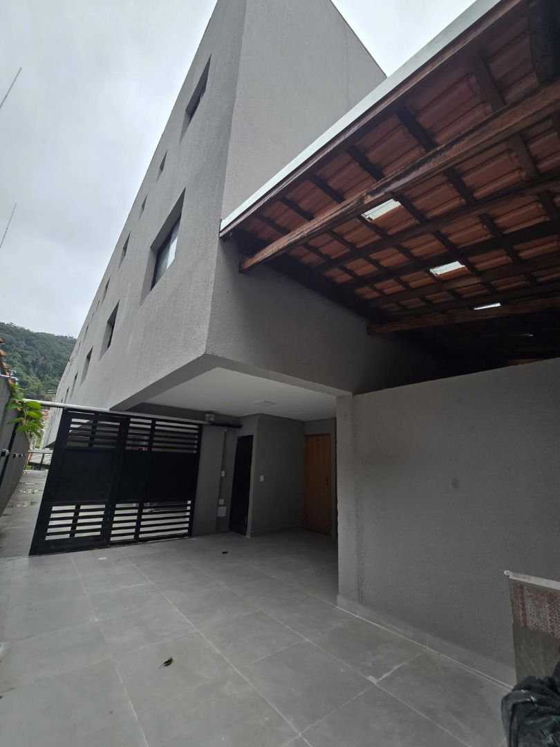 Casa com 2 dormitórios à venda, 89 m² por R$ 700.000,00 - Marapé - Santos/SP