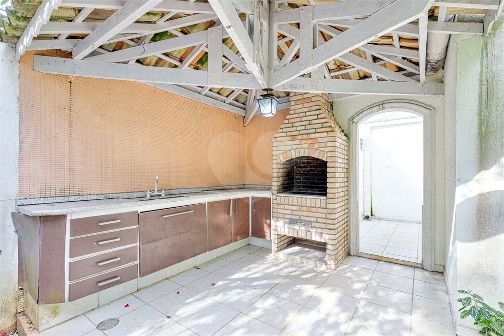 Casa à venda com 4 suítes no condomínio Solar Andaluz, São Paulo - SP