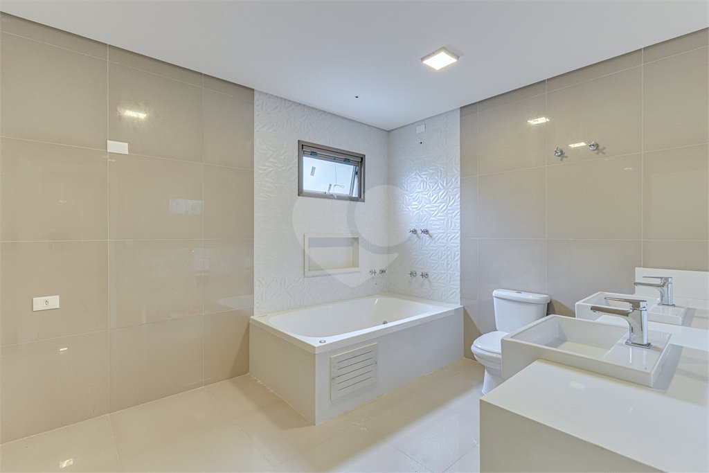 Casa à venda com 4 suítes no condomínio Carmen, São Paulo - SP