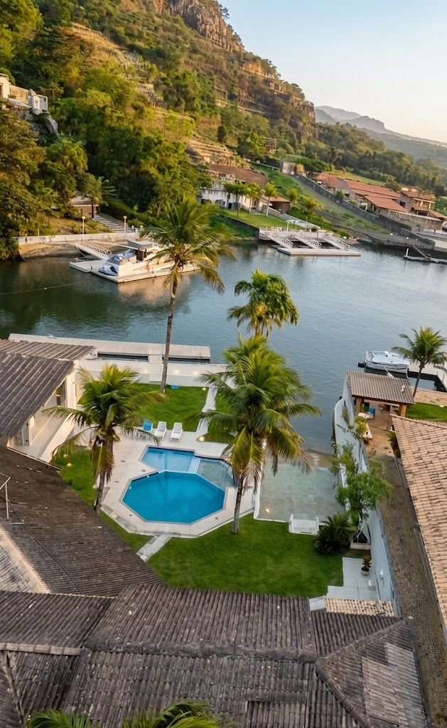 Casa com 5 dormitórios à venda, 900 m² por R$ 15.200.000,00 - Cidade Jardim Tom - Guarujá/SP