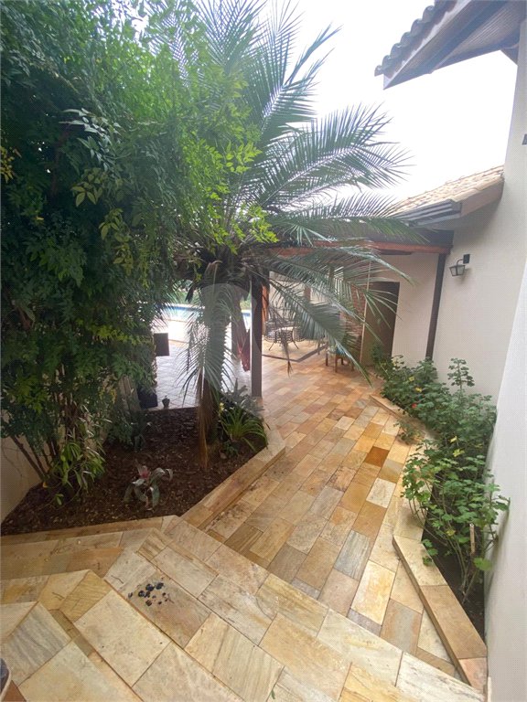 Casa à venda com 4 suítes no condomínio Vale da Santa Fé, Vinhedo - SP
