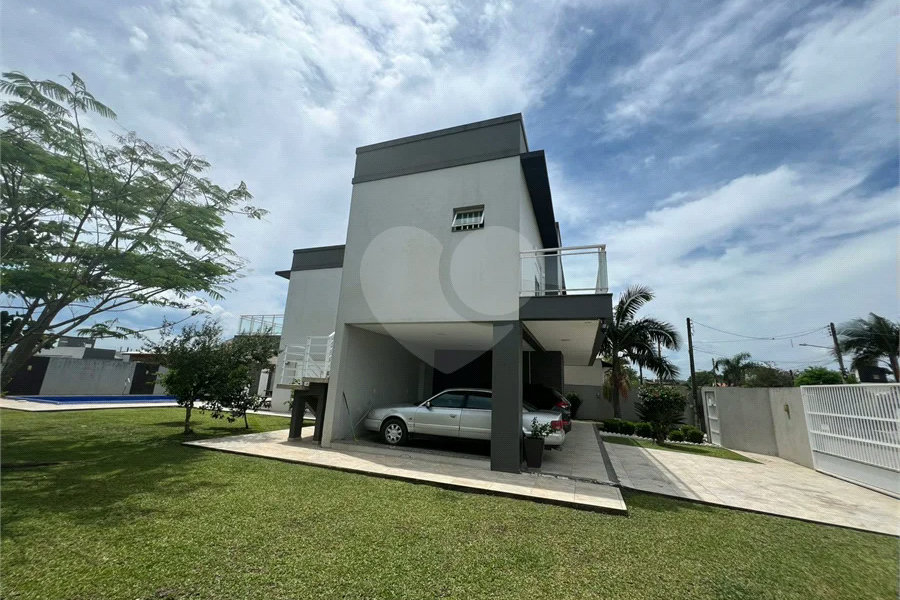 Sobrado à venda com 3 suítes em Vila São João (2º Distrito), Torres, RS