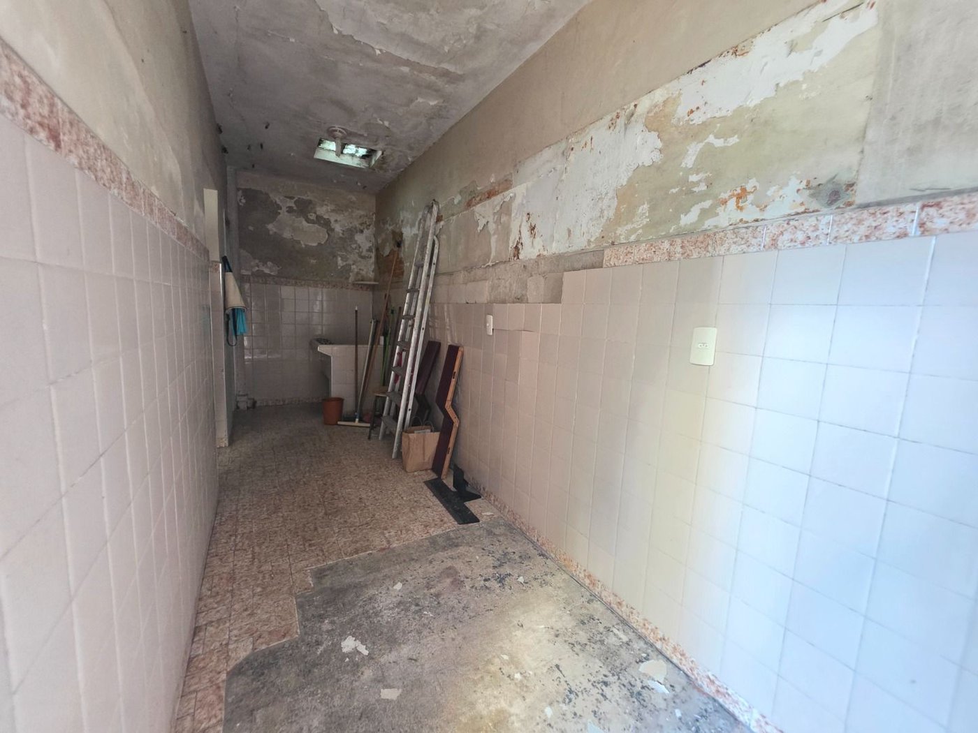 Sobrado com 3 dormitórios à venda, 129 m² por R$ 638.000,00 - Encruzilhada - Santos/SP