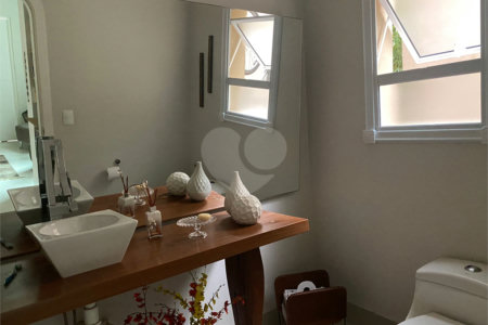 Casa à venda com 4 suítes no condomínio Granja Morumbi, São Paulo - SP