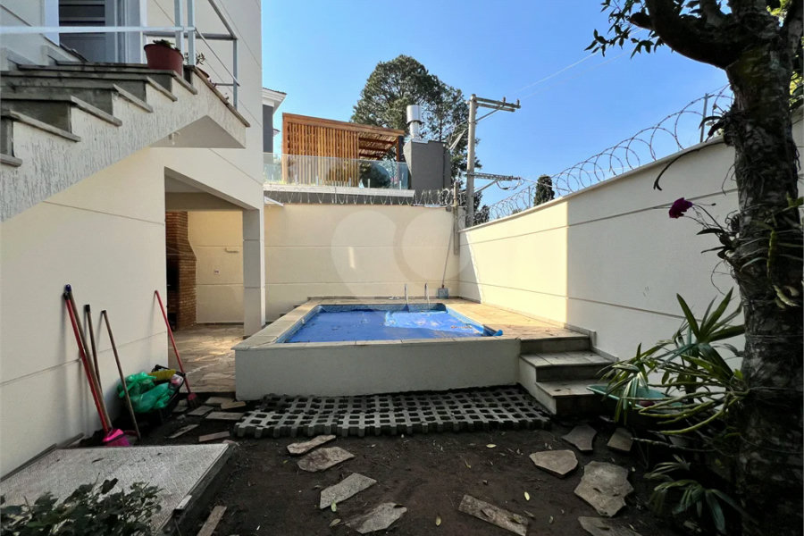 Casa à venda com 4 suítes no condomínio Residencial Cantareira, São Paulo - SP