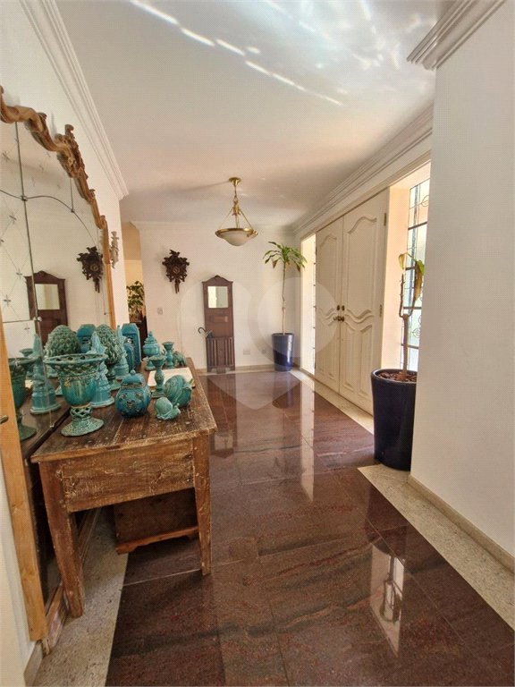 Casa à venda com 4 suítes no condomínio Estância Marambaia, Vinhedo - SP