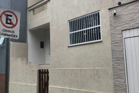 Casa com 3 dormitórios à venda, 116 m² por R$ 690.000,00 - Gonzaga - Santos/SP