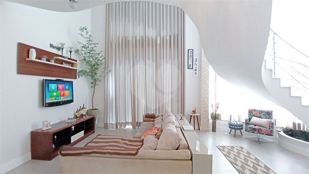 Casa à venda com 3 suítes no condomínio Vila do Sol, Valinhos - SP