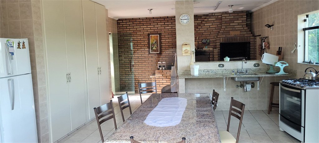 Casa à venda com 5 quartos, sendo 2 suítes, no condomínio Alpes da Cantareira, Mairiporã - SP