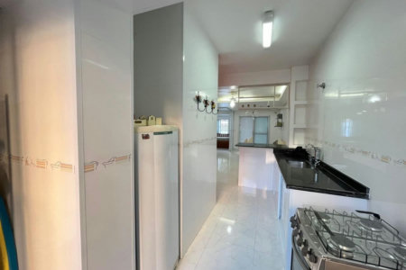Casa com 2 dormitórios à venda, 80 m² por R$ 440.000,00 - Loteamento João Batista Julião - Guarujá/SP