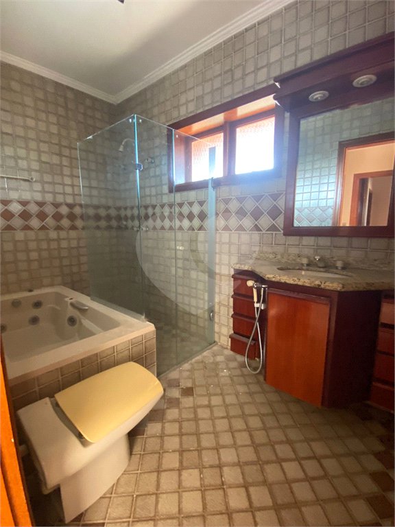 Casa à venda com 3 quartos, sendo 1 suíte, no condomínio Estância Marambaia, Vinhedo - SP