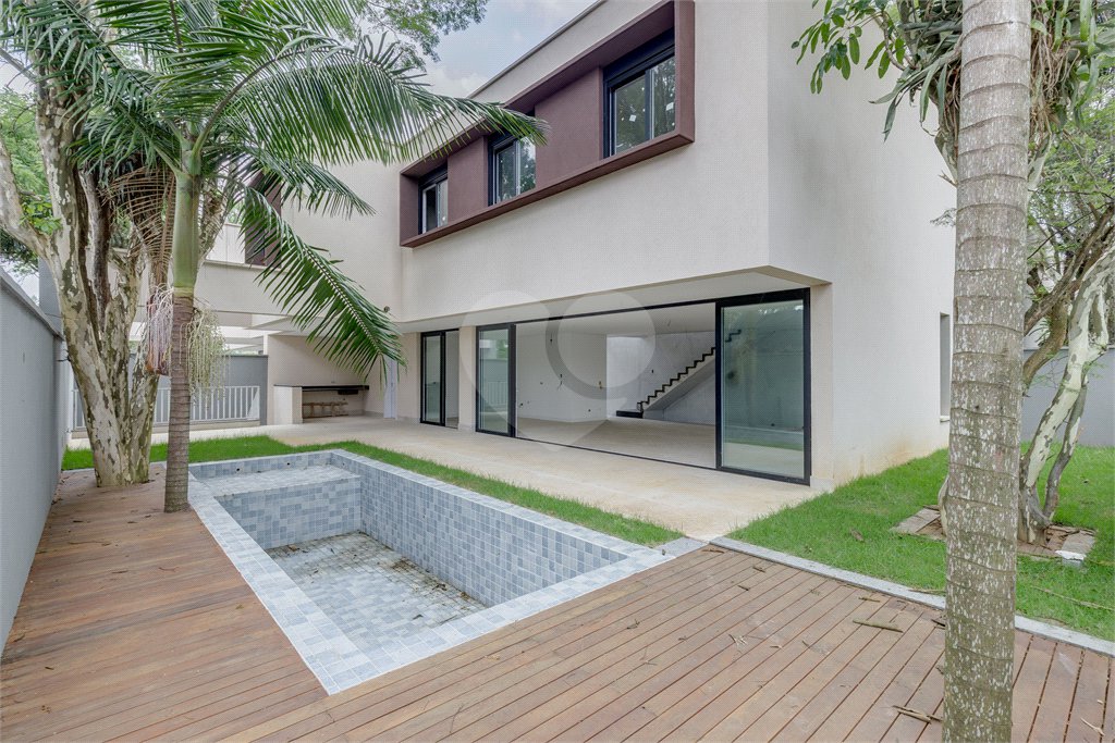 Casa à venda com 4 suítes no condomínio Garda, São Paulo - SP