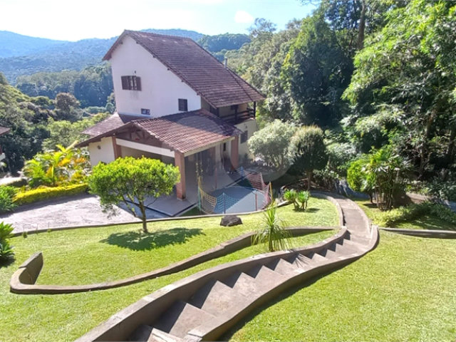 Casa à venda com 4 suítes no condomínio Alpes da Cantareira, Mairiporã - SP