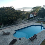 Casa à venda ou para alugar com 4 suítes no condomínio Suíça da Cantareira, Mairiporã - SP