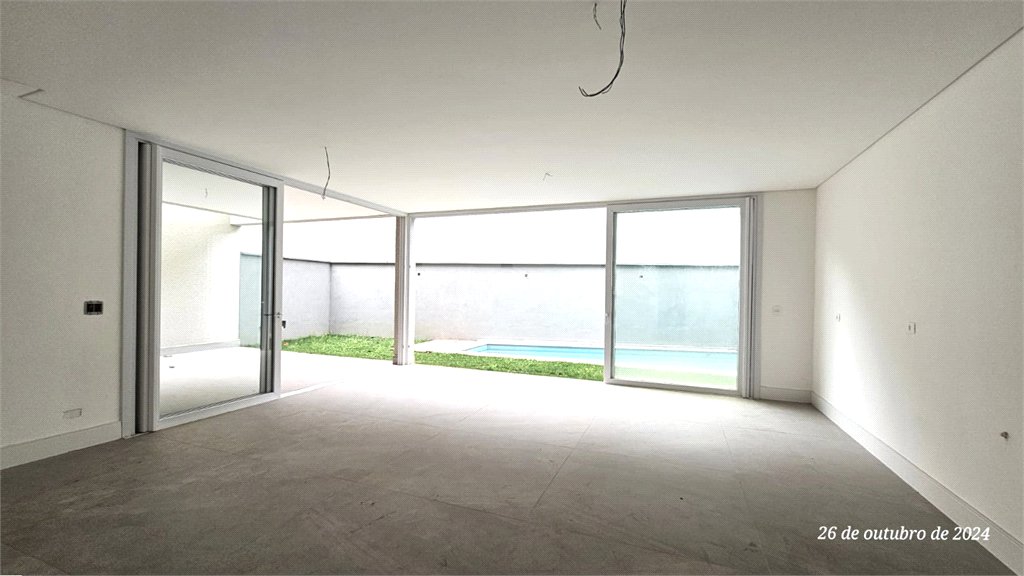 Casa à venda com 4 suítes no condomínio Vila Arese, São Paulo - SP