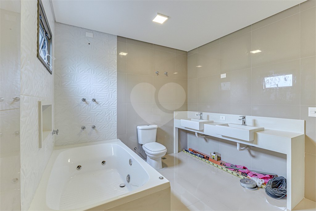 Casa à venda com 4 suítes no condomínio Carmen, São Paulo - SP