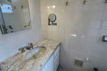 Apartamento com 4 dormitórios à venda, 259 m² por R$ 900.000,00 - Jardim Três Marias - Guarujá/SP