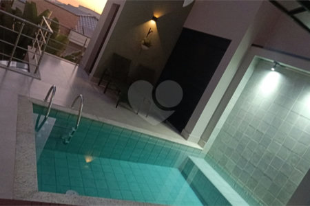 Casa à venda com 4 suítes no condomínio Sta Morriz, Campinas - SP
