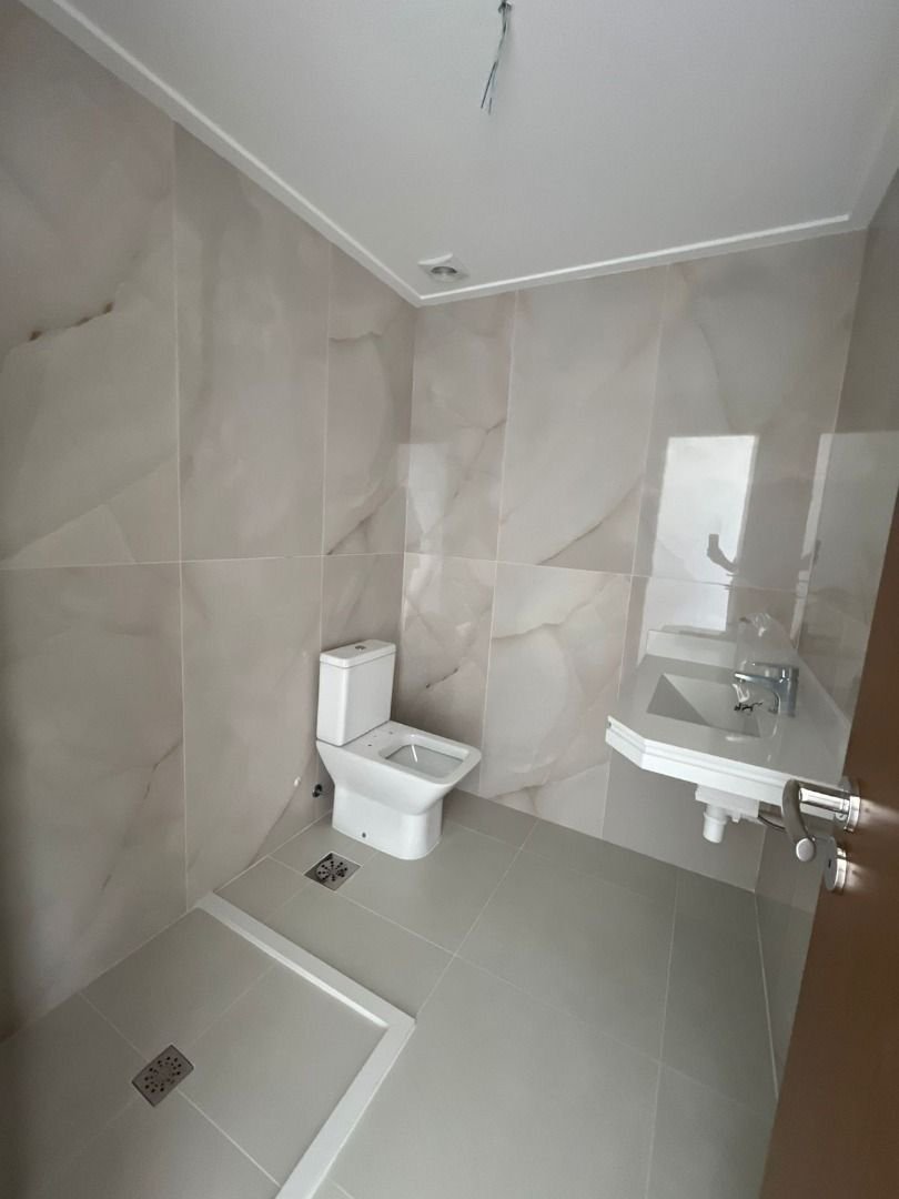 Apartamento Garden de Alto Padrão na Quadra da Praia – Exclusividade e Sofisticação na Aparecida, Santos