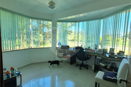 Casa à venda com 4 suítes no condomínio Bougainville, Peruíbe - SP