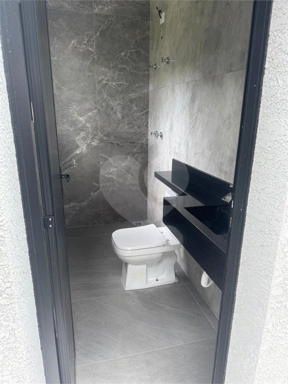 Casa à venda com 4 suítes no condomínio Figueira Garden, Atibaia - SP