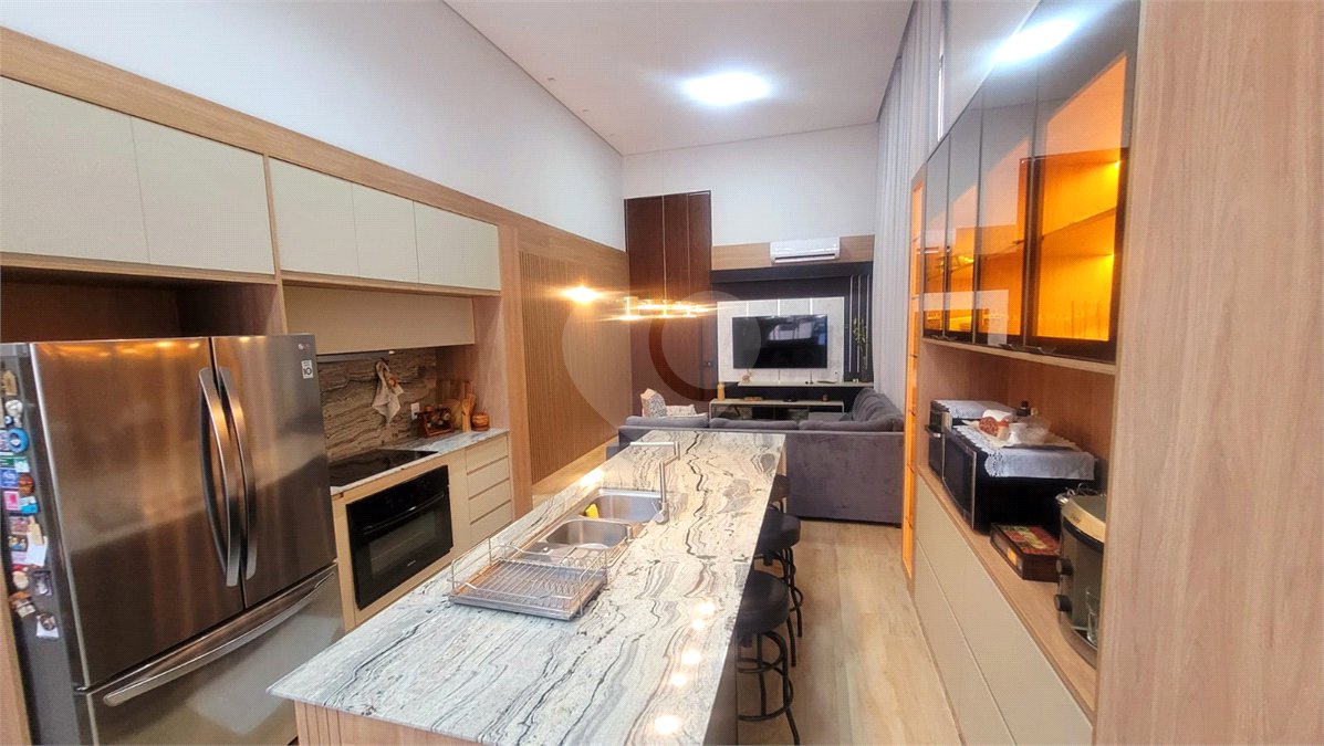 Casa à venda com 4 suítes no condomínio Sta Morriz, Campinas - SP