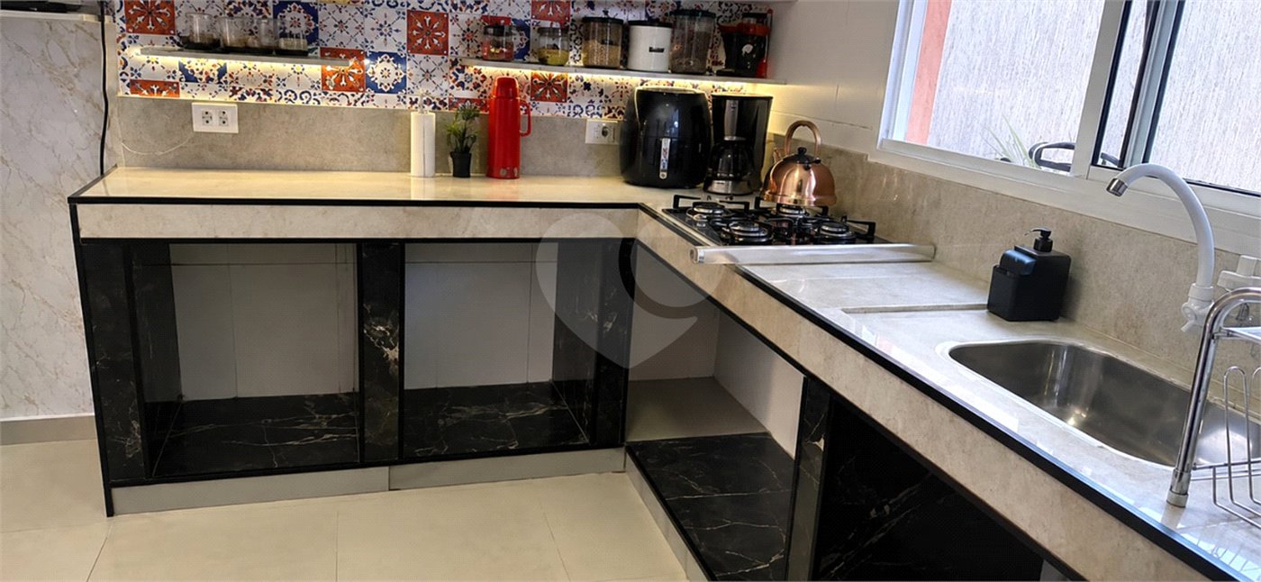Casa à venda com 2 suítes no condomínio Cristal de Maitinga 1, Bertioga - SP