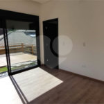 Casa à venda com 4 suítes no condomínio Figueira Garden, Atibaia - SP
