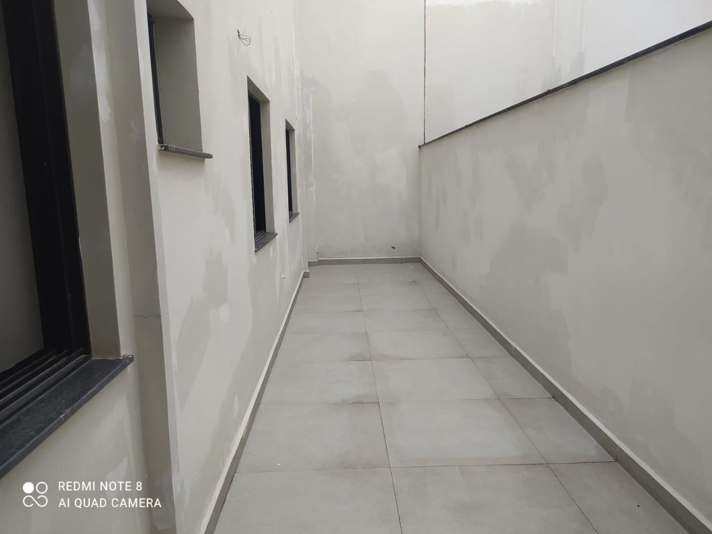 Casa com 3 dormitórios à venda, 92 m² por R$ 798.000,00 - Estuário - Santos/SP