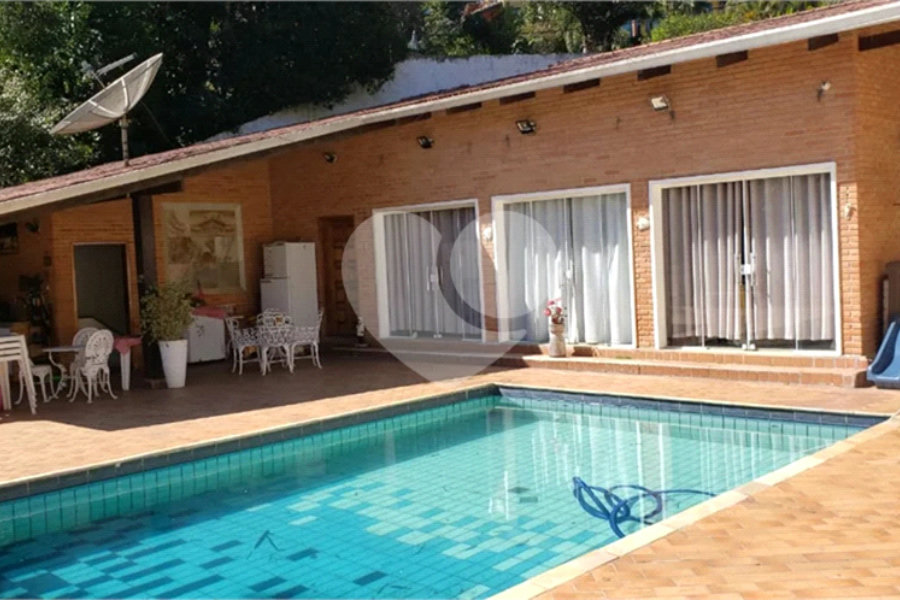 Casa à venda com 4 suítes no condomínio Alpes da Cantareira, Mairiporã - SP