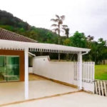 Casa com 5 dormitórios à venda, 900 m² por R$ 15.200.000,00 - Cidade Jardim Tom - Guarujá/SP