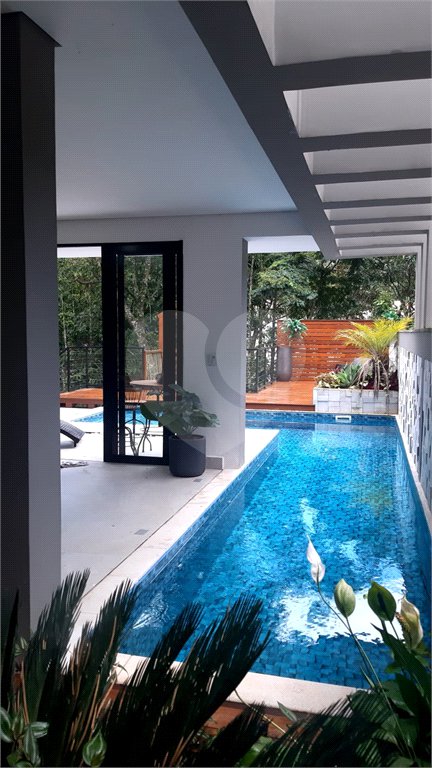 Casa à venda com 4 suítes no condomínio Jardim Itatinga, São Paulo - SP